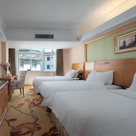 Vienna International Hotel Lijiang Yuxue Avenue Εξωτερικό φωτογραφία